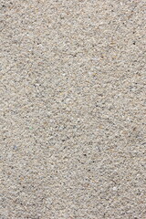 Textured natural gray sand showcasing intricate details and natural patterns