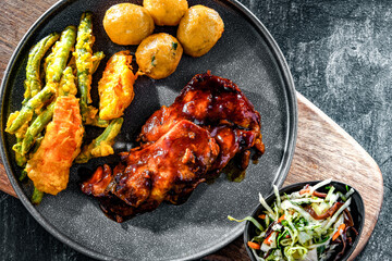 Chicken thighs in tamarind sauce with veggies tempura and potato