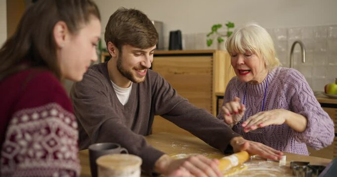 Family baking time brings smiles and laughter in cozy kitchen setting