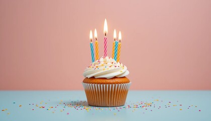 Deliciously Decorated Cupcake with a Brightly Lit Candle on Top Celebrating a Joyous Occasion