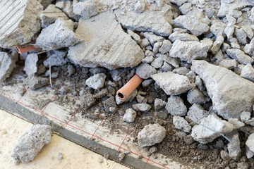 Broken floor slab in the house. Construction work