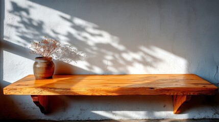 Obraz premium Cozy Alabaster White Wall, decorated with warm wood trim, bathed in soft sunlight, creating a serene and inviting atmosphere perfect for relaxation and comfort