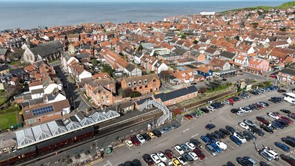 Obraz premium Sheringham Railway station and town centre Norfolk UK seaside town drone,aerial