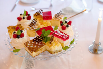 Sweet Pastries on Cake Stand at Celebration Table Gathering