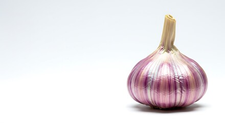 Obraz premium prismatic garlic, isolated right, white, copy space left. ,isolated on bright background, no text