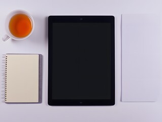 Flatlay Minimalist Workspace,  Tablet, Notebook, Tea