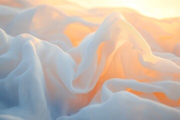 Obraz premium Soft, flowing fabric textures illuminated by warm sunlight.