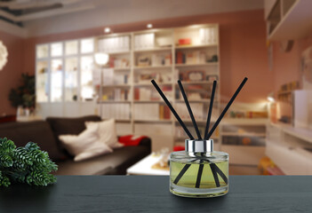 luxury aroma scent reed diffuser glass bottle and black fibers sticks are on black nice design...