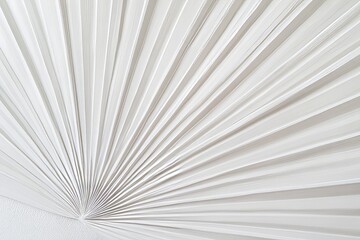 Pleated white fabric creates a radiating design.