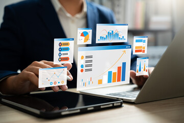 Professional businessman using laptop to review performance indicators, Business growth charts, Market research data for financial and investment decisions. Strategic planning and corporate success.