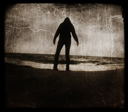 Creative image of person standing in a disaster by the water.