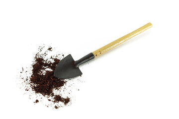 Shovel with soil. Isolated on white background.