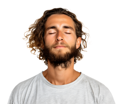 A young man with eyes closed, sporting curly hair and a beard, against a stark black backdrop.