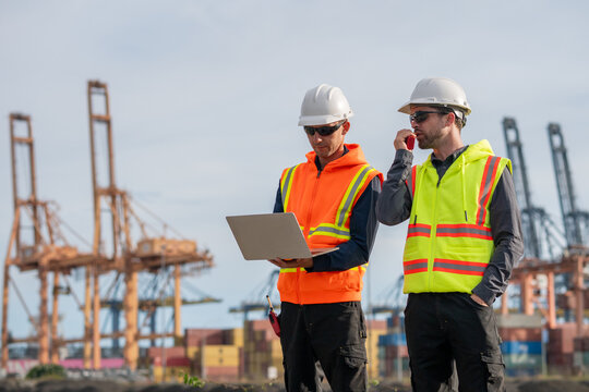 Industrial engineer workers operations marine port cranes loading and unloading of cargo ships global trade and supply chain import export environment monitoring responsible global economy.