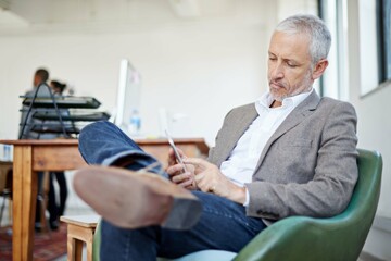 Break, mature or businessman in startup with smartphone for social network, blog media website or...