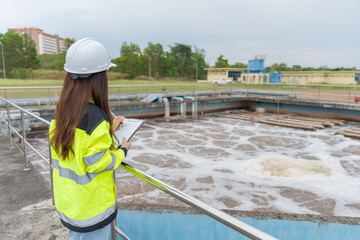 Environmental engineers work at wastewater treatment plants,Water supply engineering working at...