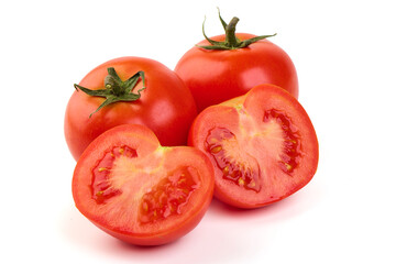 Ripe fresh tomatoes, close-up, isolated on white background.
