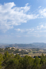 Obraz premium Vinsobres village dominating Cotes du Rhone vineyards in Drome, France