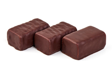 Chocolate candies close-up, isolated on white background.