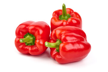 Fresh red bell peppers isolated on white background.