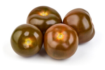 Fresh ripe kumatoes, isolated on white background.