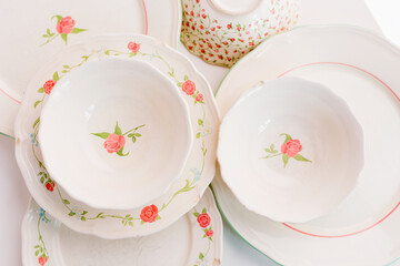 Closeup of porcelain plates and bowls