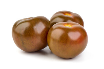 Fresh ripe kumatoes, isolated on white background.