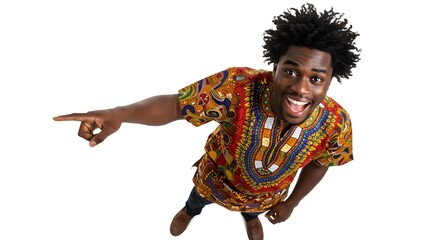 Joyful african man pointing with a big smile, dressed in ethnic attire.