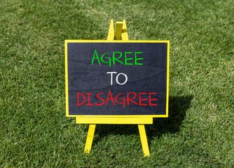 Agree to disagree symbol. Concept words Agree to disagree on beautiful yellow blackboard. Beautiful...