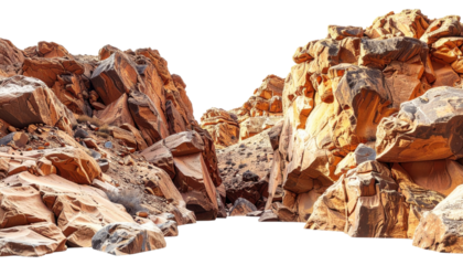 Large, rugged orange and brown rock formations with jagged edges and textured surfaces dominate the scene.