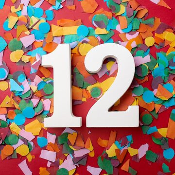 Number 12 with confetti. Photo for twelfth birthday or anniversary party