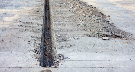 Drilling and repairing the road. Asphalt road is drilled with a road drill. Transportation-travel-transportation.