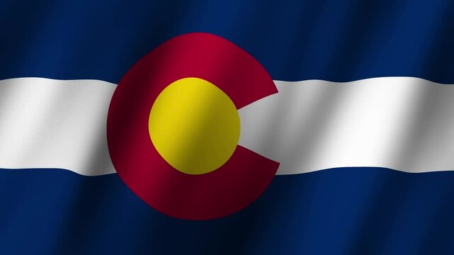 American flag waving proudly with Colorado state colors representing freedom and patriotism in the heart of the Rockies