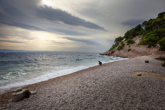 Beautiful landscape in Park Osejava near Makarska, Croatia. Gravel path in forest near Adriatic sea. Nugal Beach.
