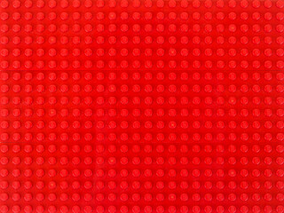 Fototapeta premium Fondo rojo de placa base de LEGO