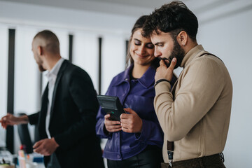 Business professionals sharing ideas while collaborating in a modern office environment, fostering teamwork.