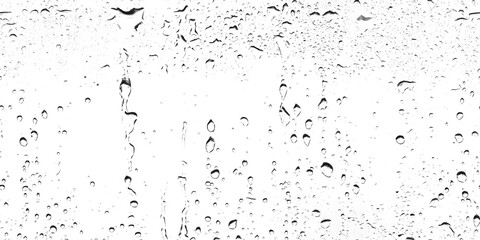 Water droplets on a glass surface transparent and clear captured against a white and transparent background creating a beautiful abstract composition.