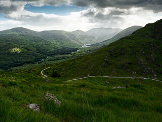 The breathtaking beauty of the Irish countryside is captured in this image of verdant hills and a...