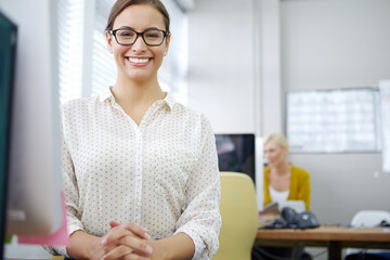 Portrait, smile and business woman in startup on computer for research, information or email. Face,...