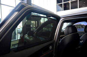 Interior of a modern car with black leather seats