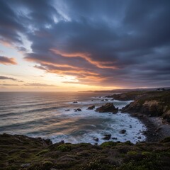 Fototapeta premium Dramatic Ocean Sunset with Rocky Coastline
