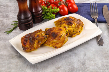 Roasted chicken thighs  with spices