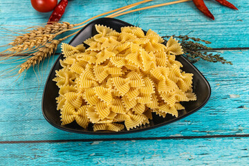 Raw dry farfalle for cooking