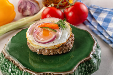 Beefsteak chop with roasted egg