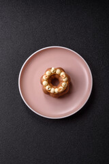 Round chocolate tart or pie with cream berry filling