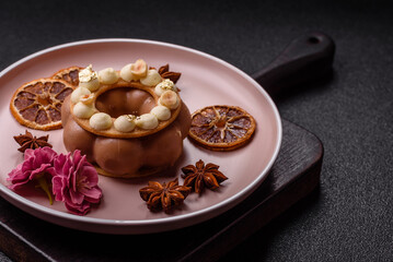 Fototapeta premium Round chocolate tart or pie with cream berry filling