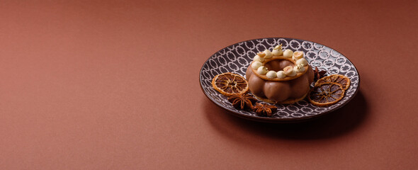 Round chocolate tart or pie with cream berry filling