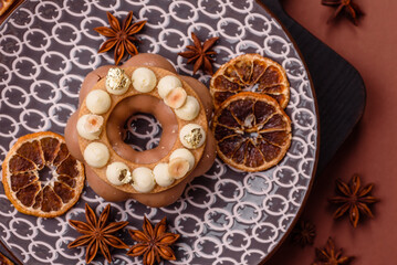 Round chocolate tart or pie with cream berry filling