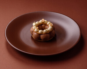 Round chocolate tart or pie with cream berry filling