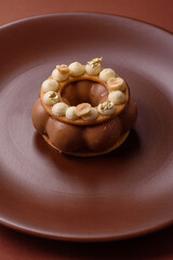 Round chocolate tart or pie with cream berry filling